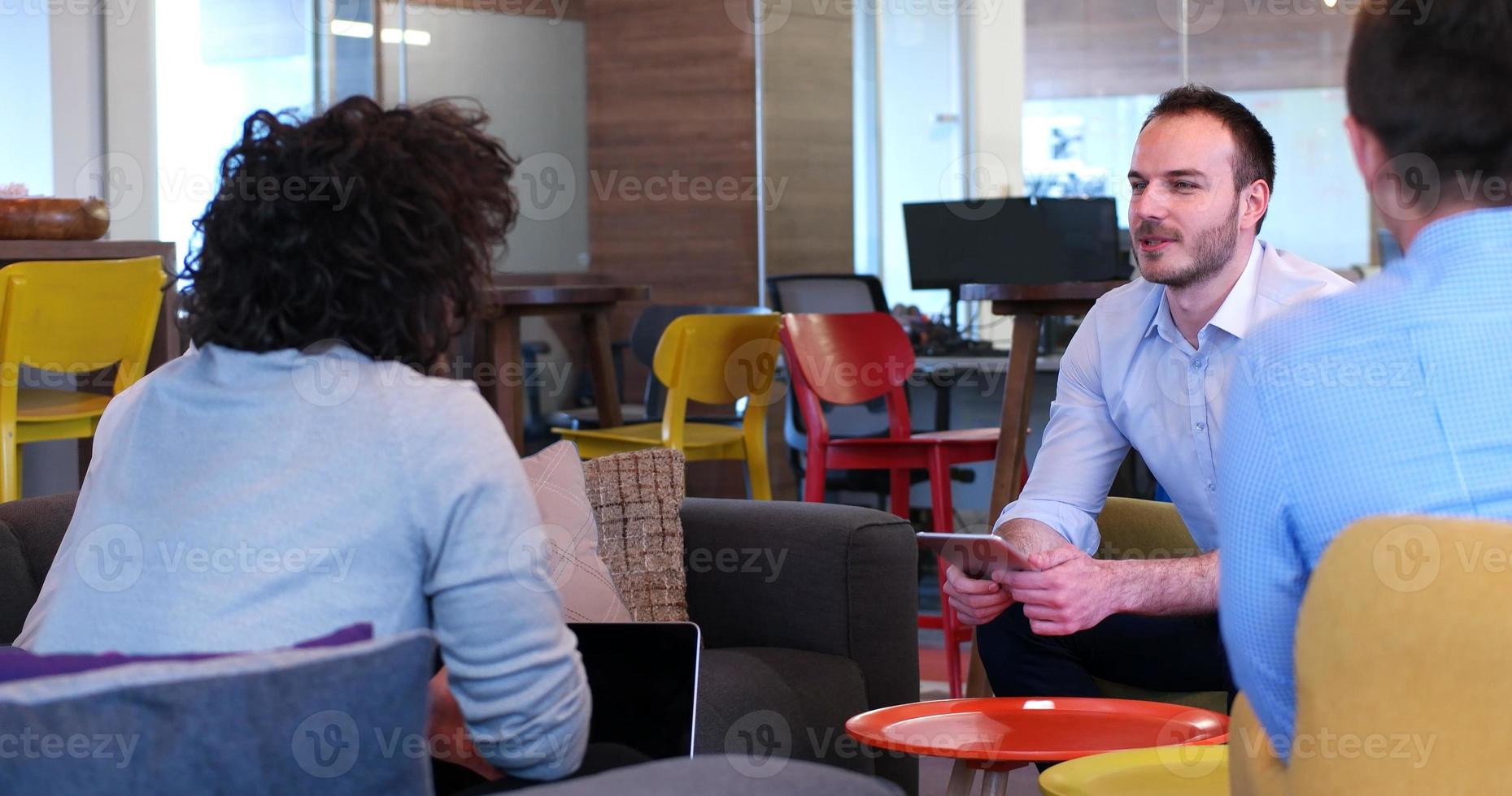 Startup Business Team At A Meeting at modern office building photo