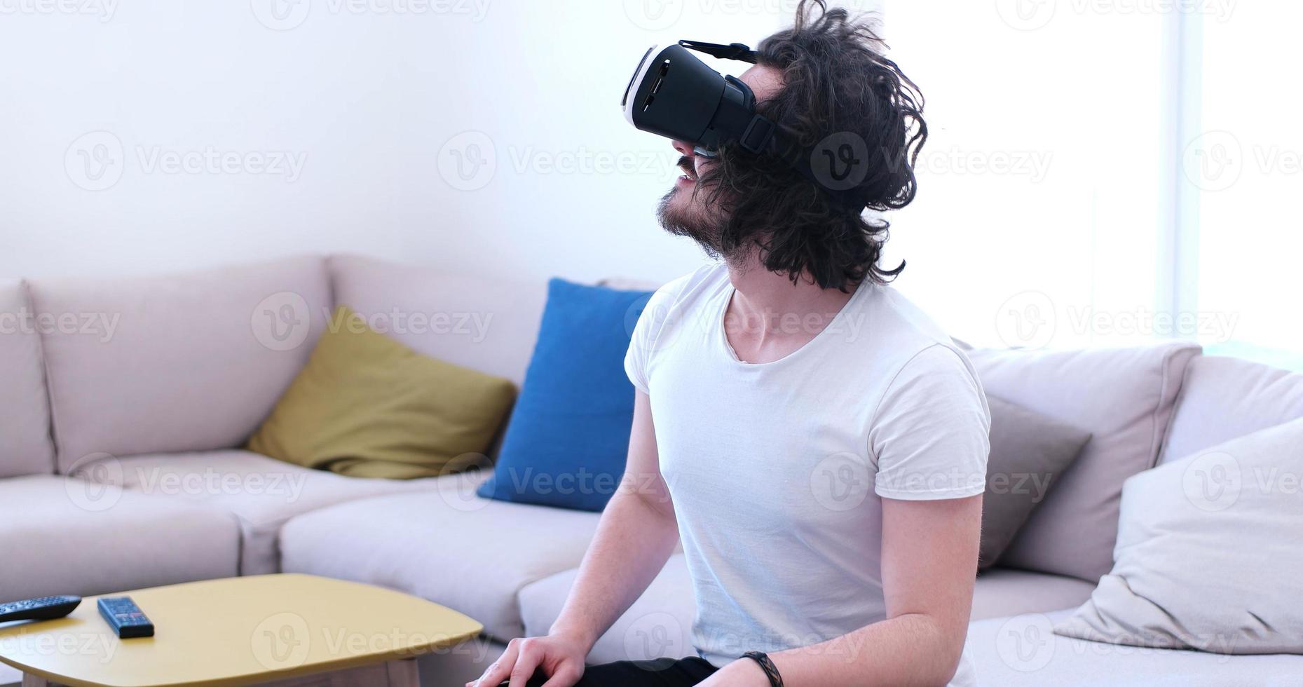man using VR-headset glasses of virtual reality photo