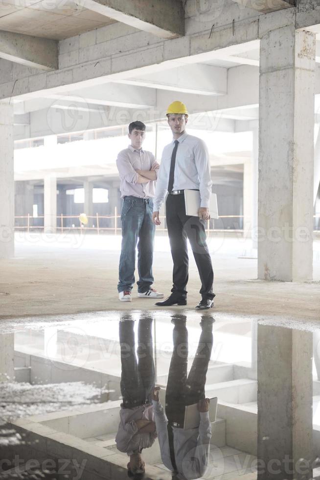 Team of architects on construciton site photo