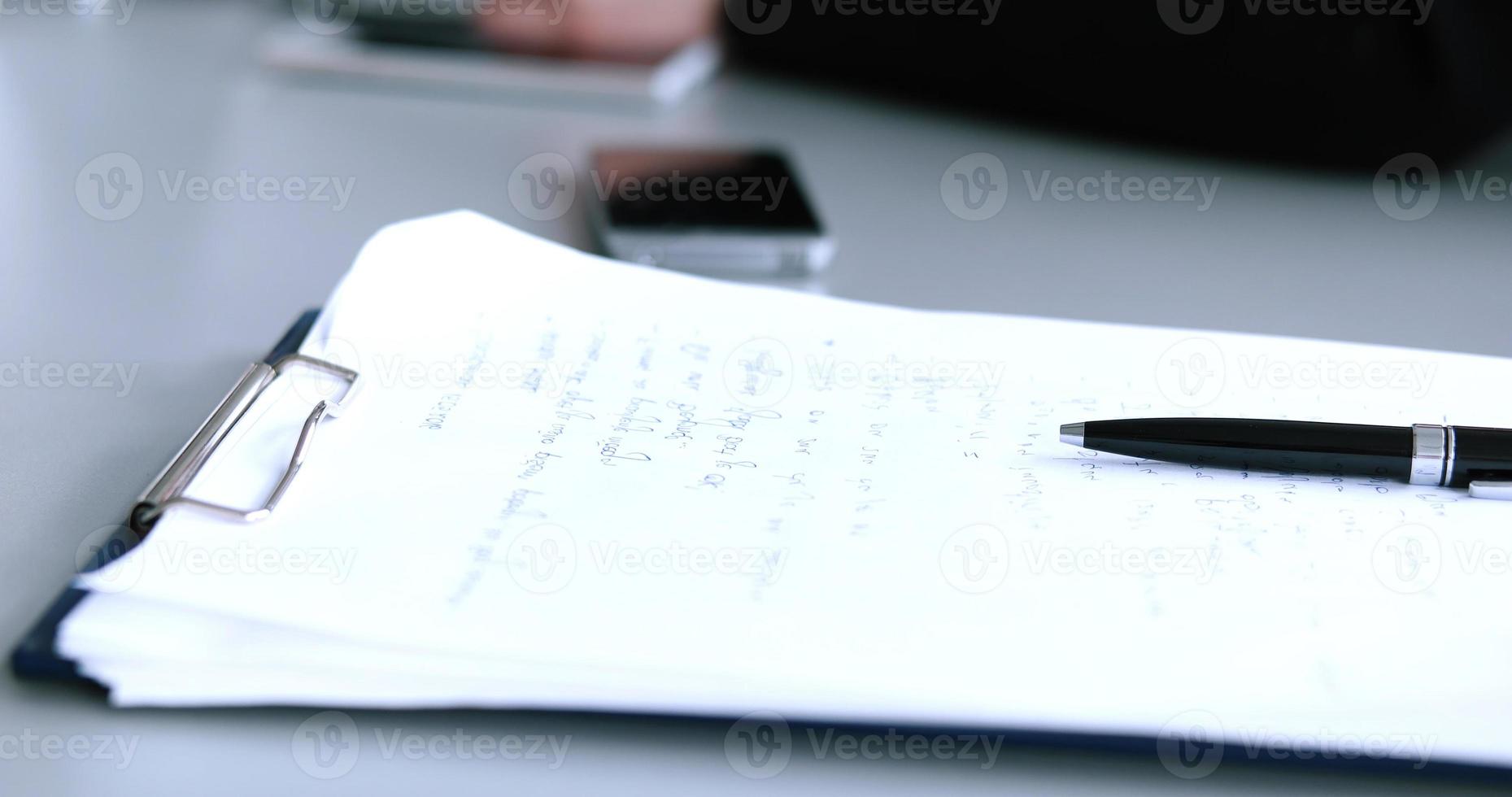 office and teamwork concept - group of business people having a meeting photo