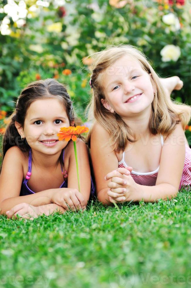 two happy girls have fun outdoor photo