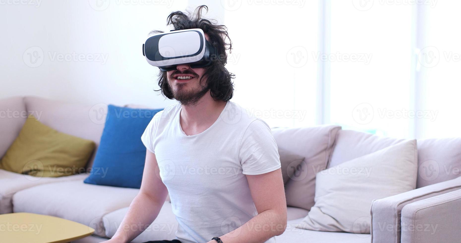 man using VR-headset glasses of virtual reality photo