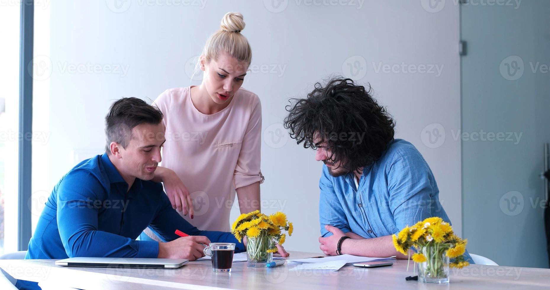 Startup Business Team At A Meeting at modern office building photo