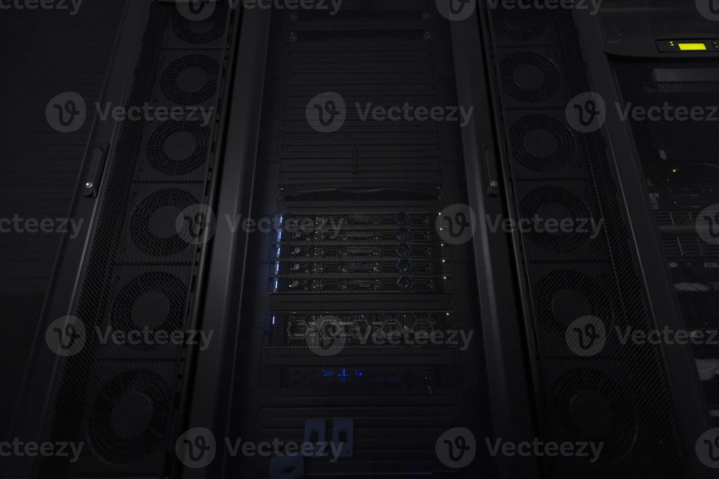 Data Center With Multiple Rows of Fully Operational Server Racks. Modern Telecommunications, Cloud Computing, Artificial Intelligence, Database, Supercomputer Technology Concept. photo