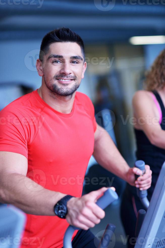 man running on the treadmill photo