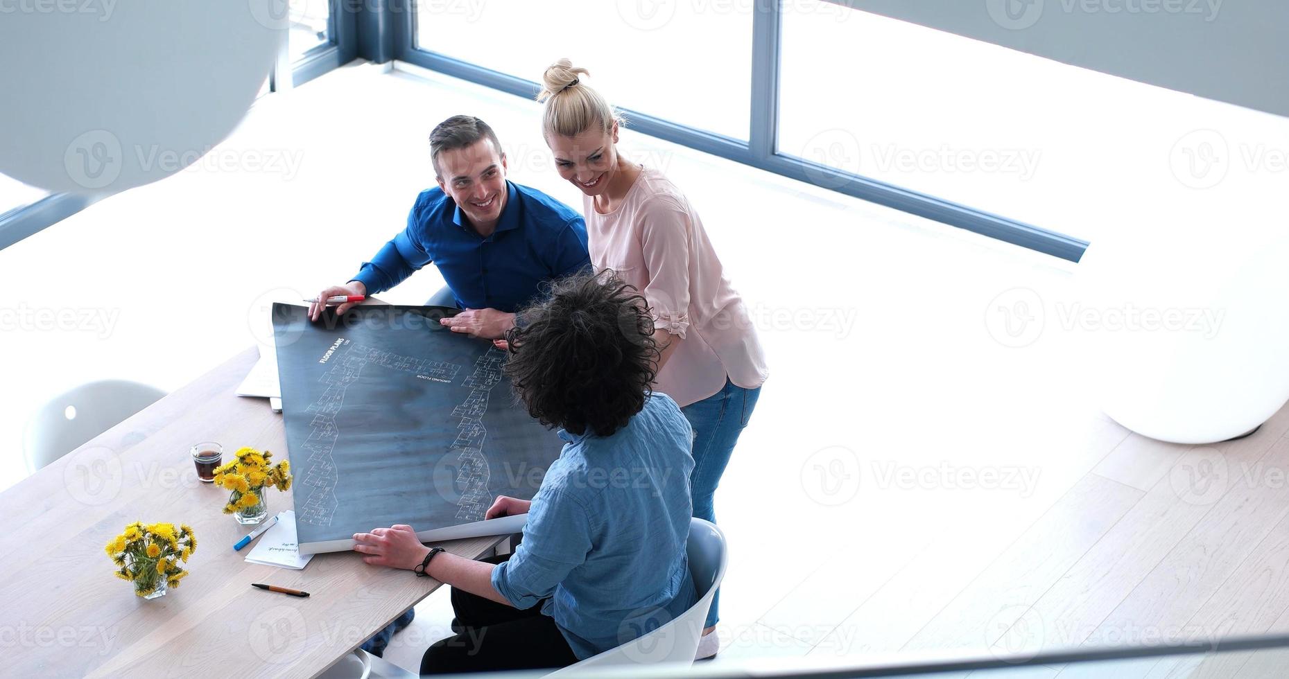 Startup Business Team At A Meeting at modern office building photo