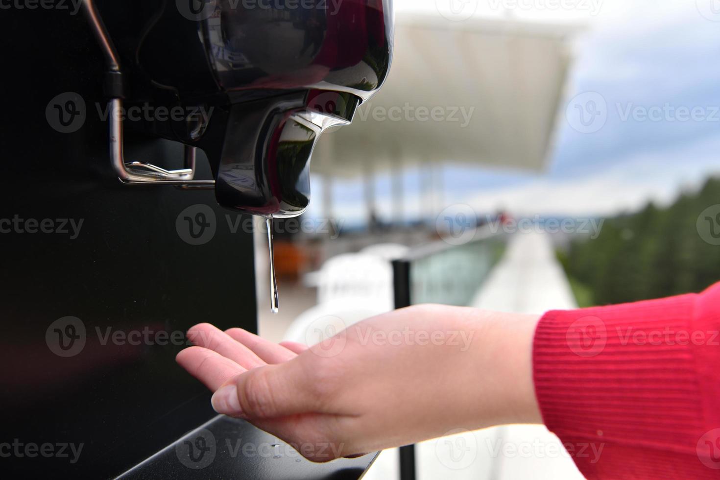 hands disinfection in restaurant photo