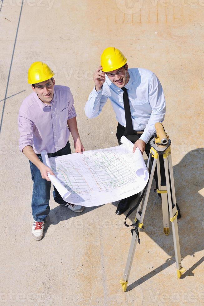 Team of architects on construciton site photo