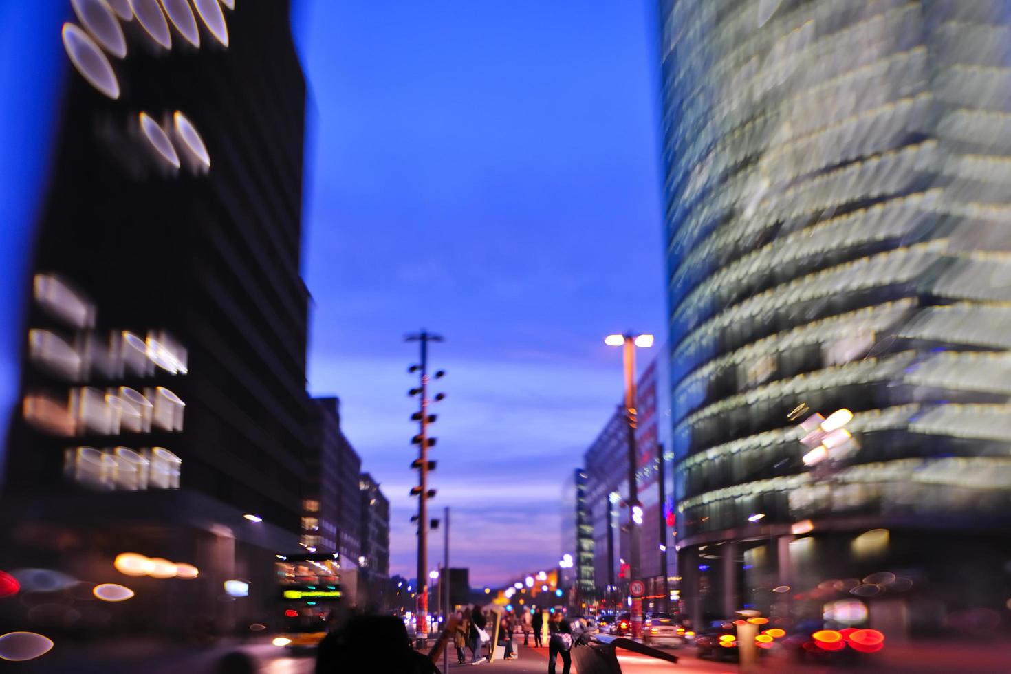 City night with cars motion blurred light in busy street photo