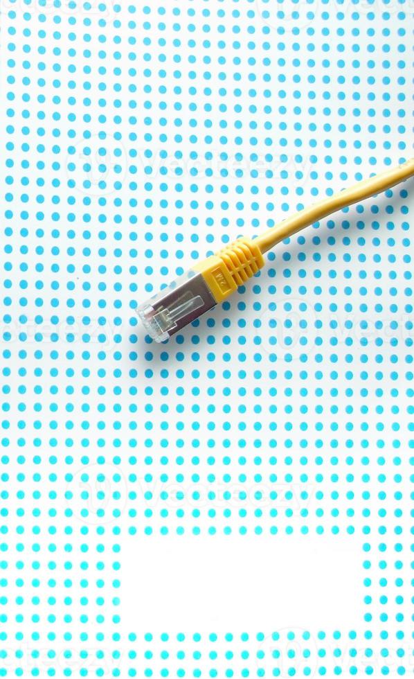 USB cable on dotted background photo
