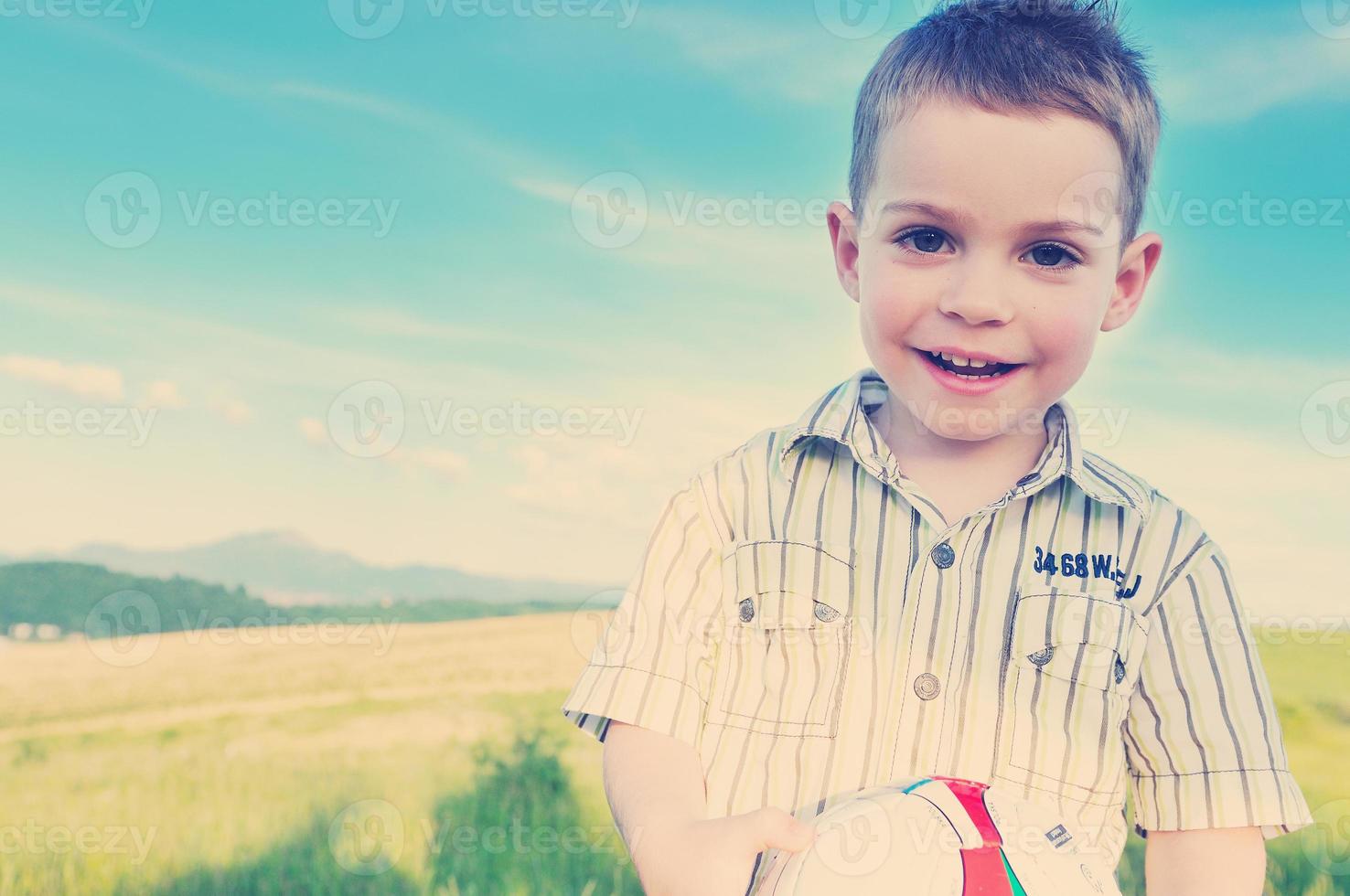 Child enjoying outdoors photo