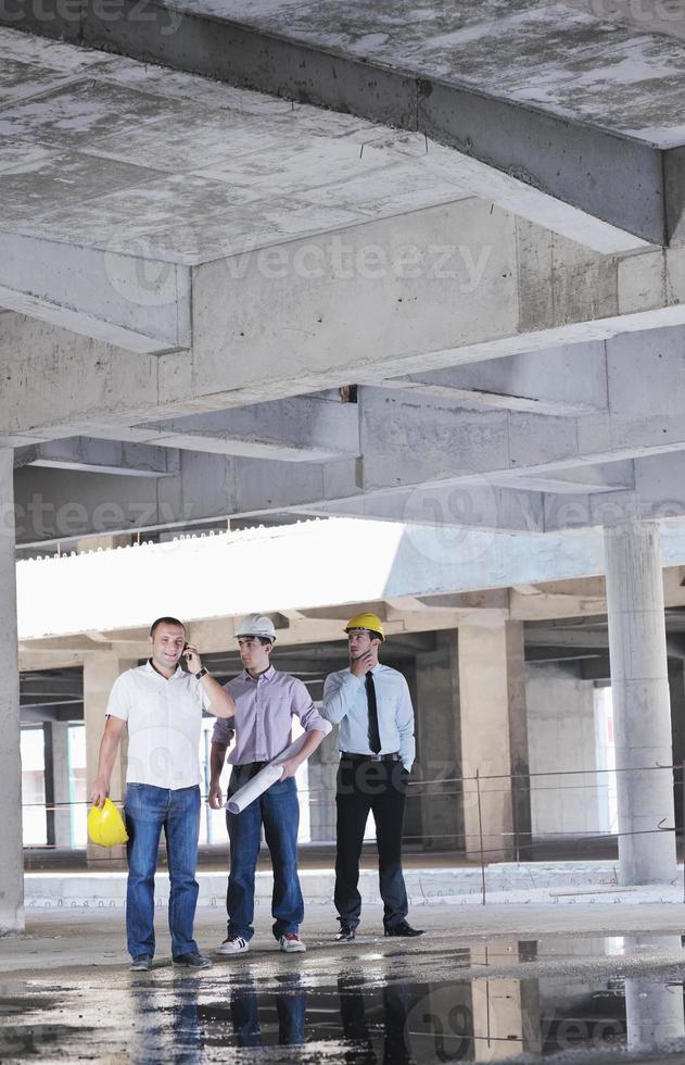 Team of architects on construciton site photo