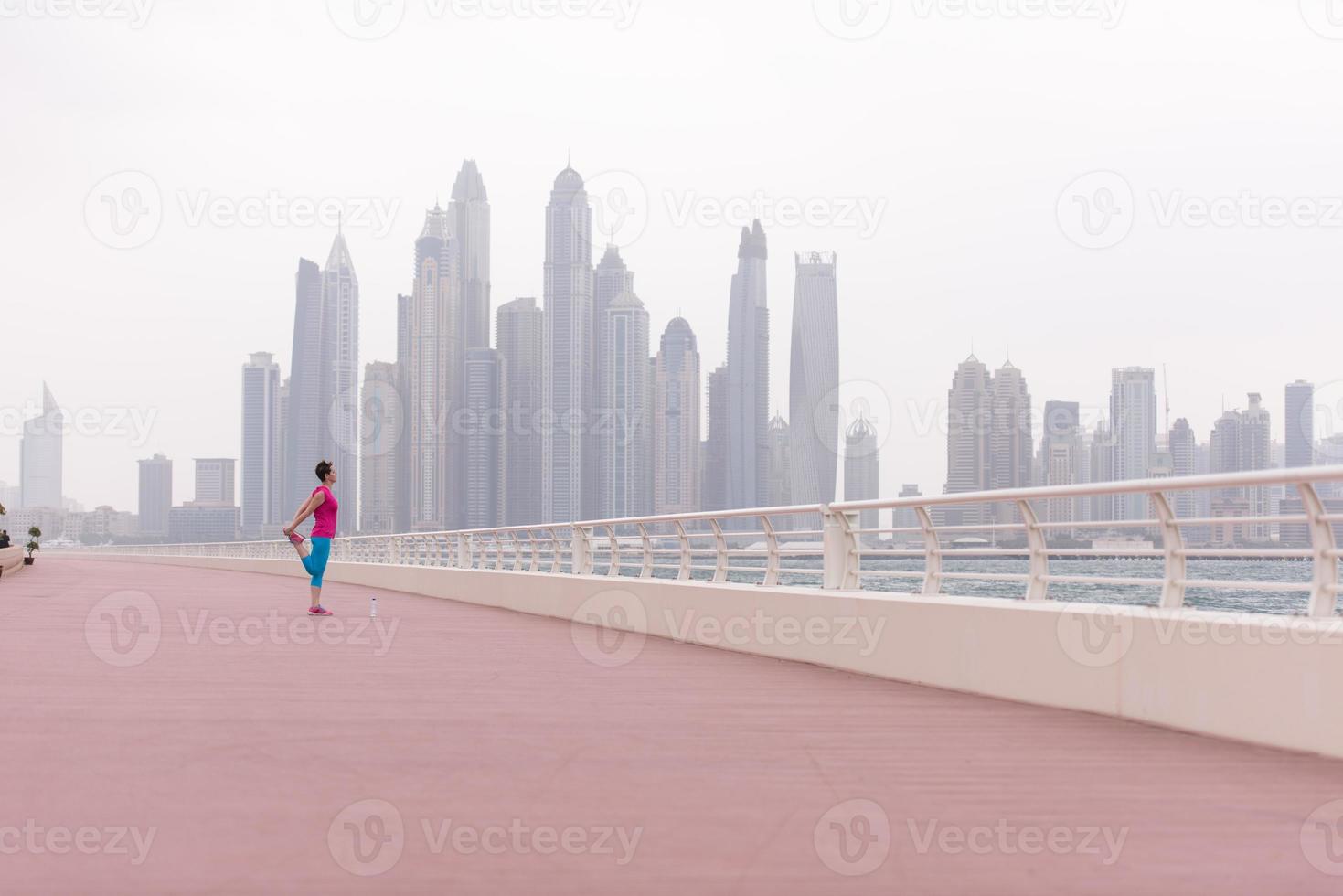 woman stretching and warming up photo