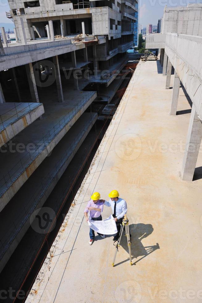 Team of architects on construciton site photo