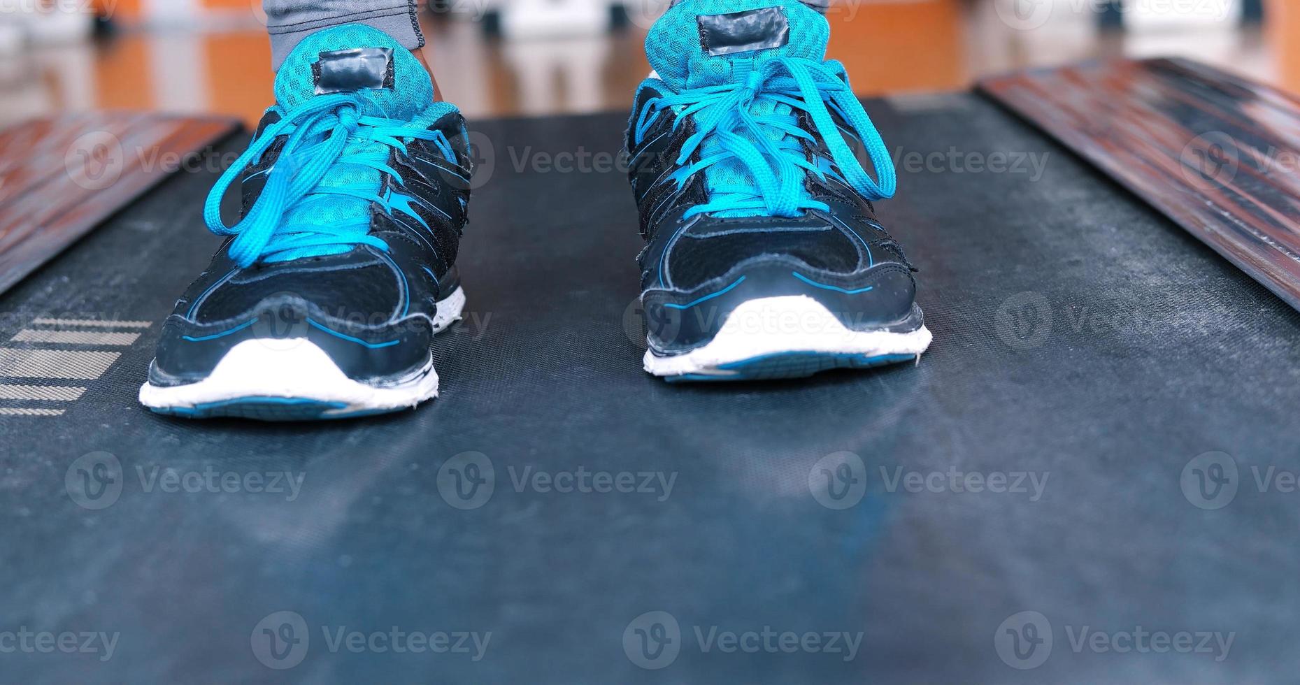 black female feet in sneakers photo