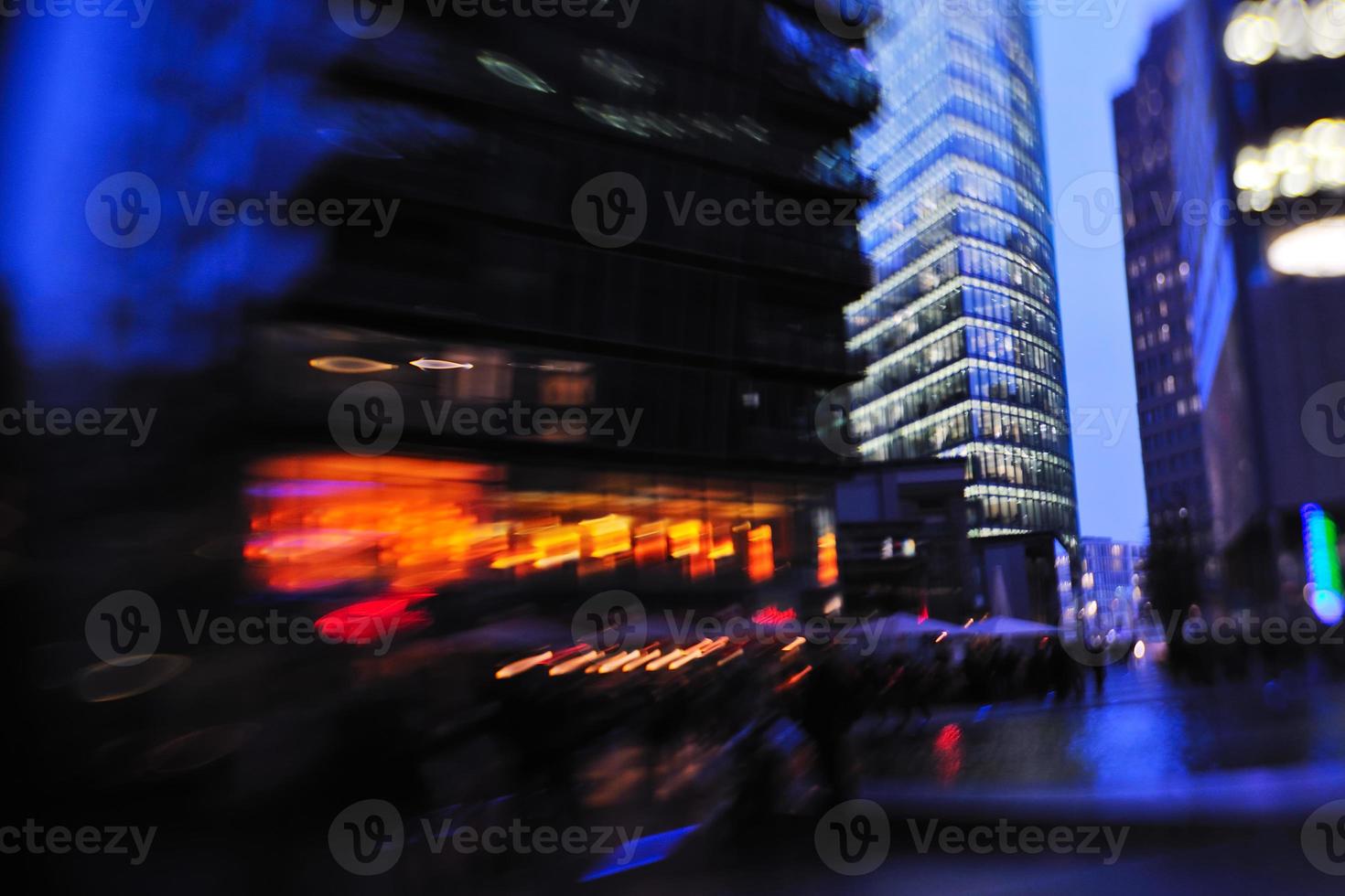 City night with cars motion blurred light in busy street photo