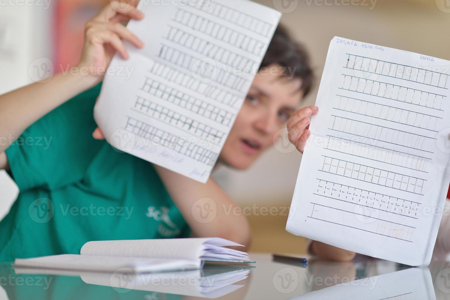 Boy doing homework photo