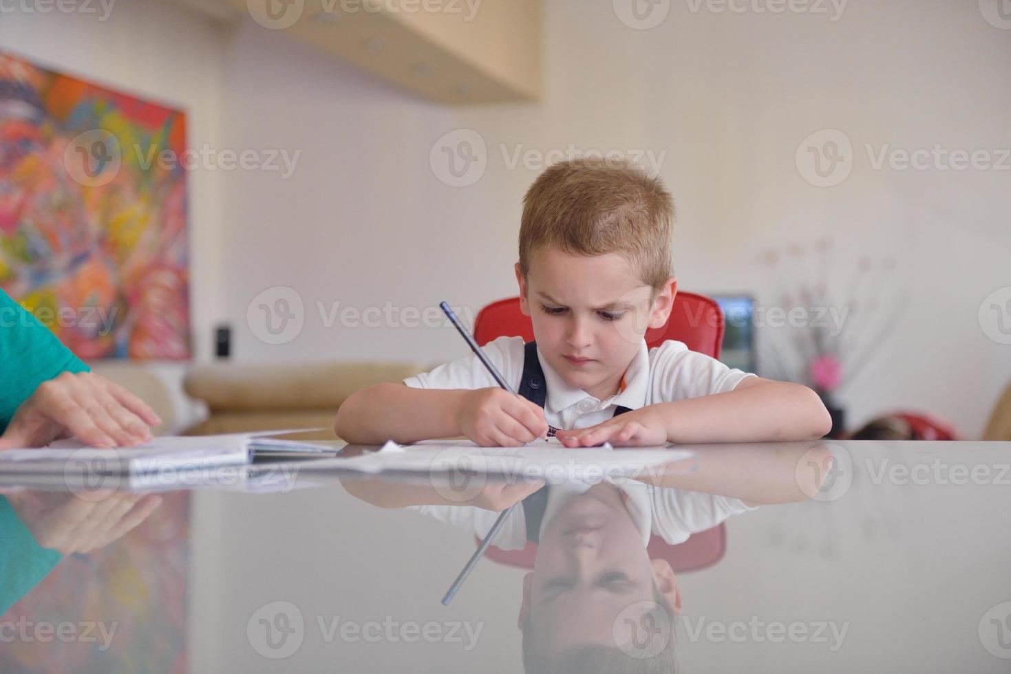 Boy doing homework photo