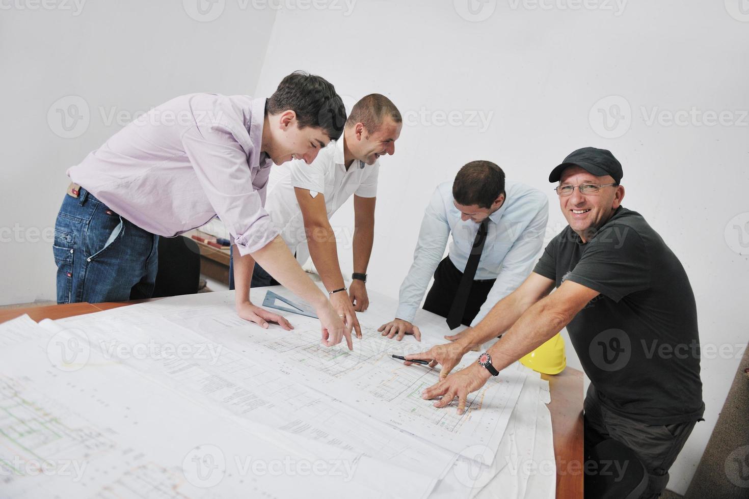 Team of architects on construciton site photo