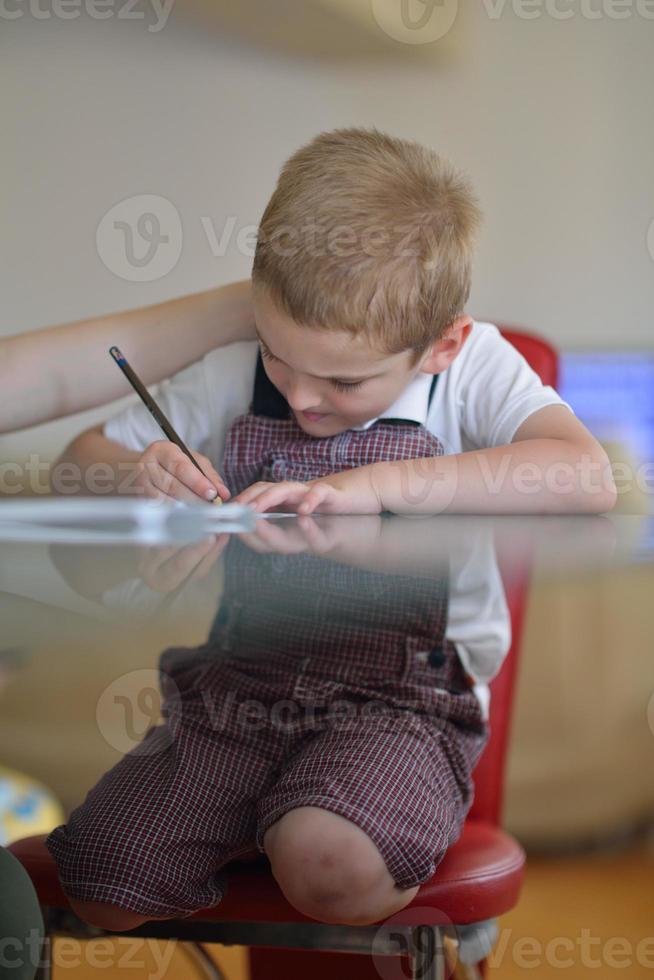 Boy doing homework photo