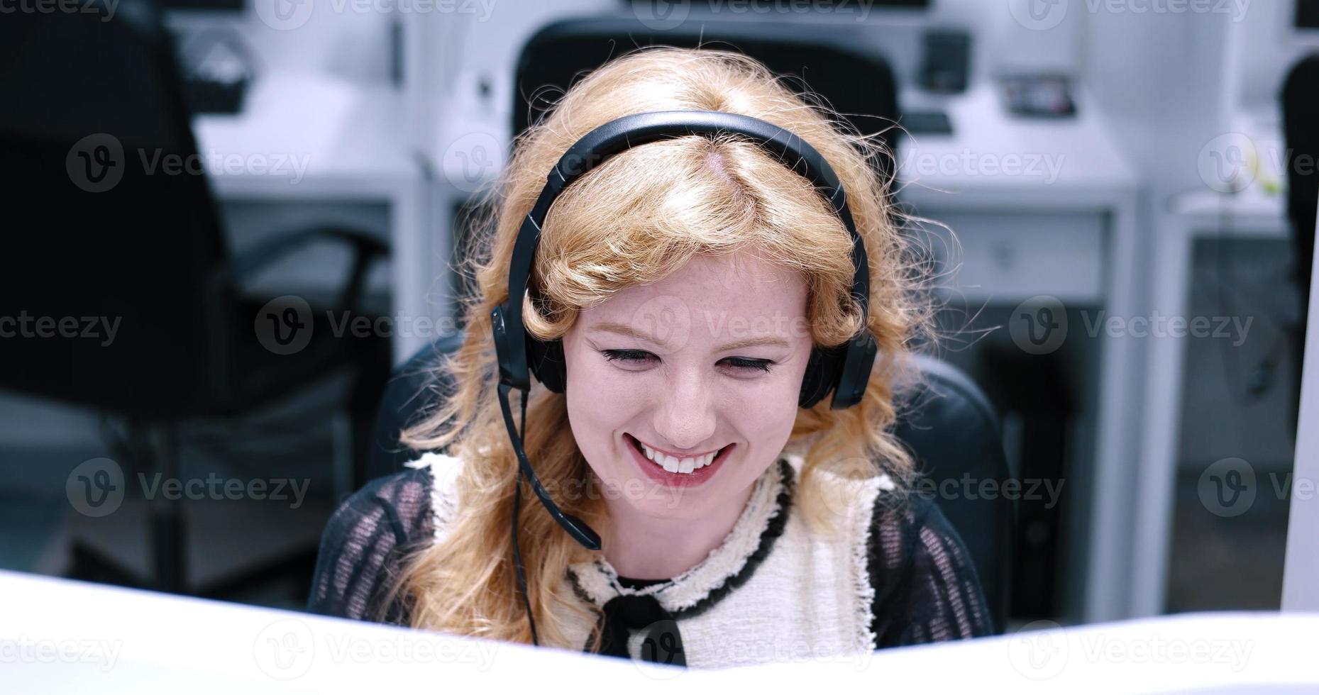 female call centre operator doing her job photo