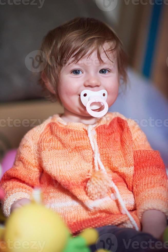 child playing with toys  at home photo