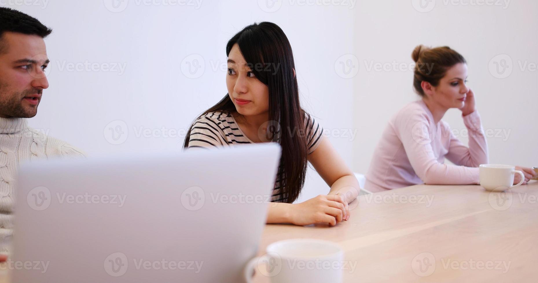 Startup Business Team At A Meeting at modern office building photo