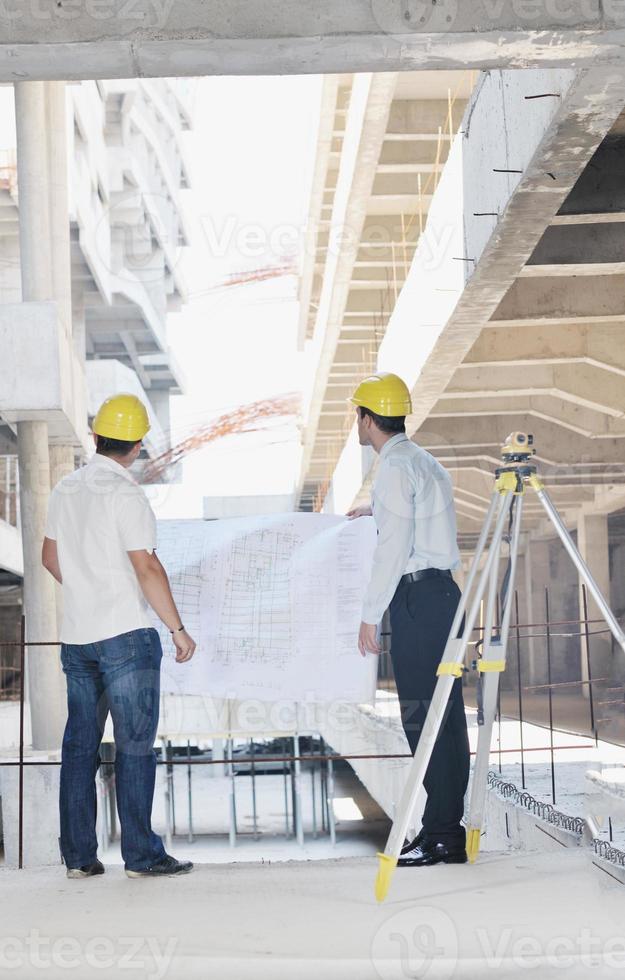 Team of architects on construciton site photo