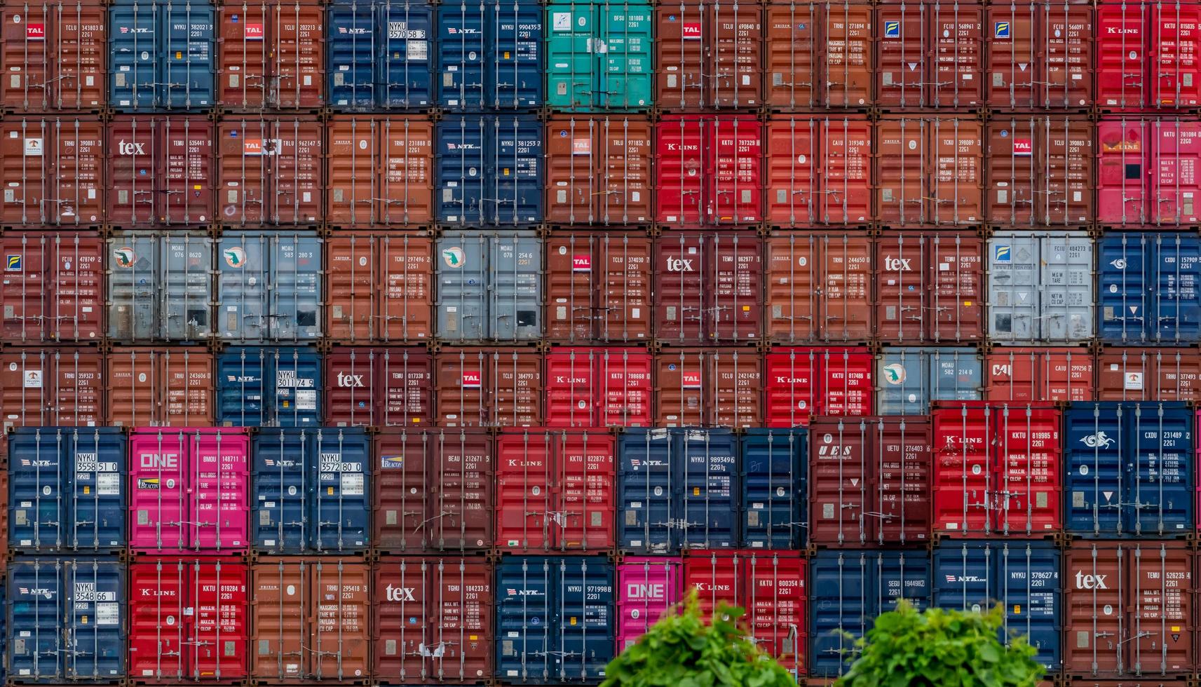 CHONBURI, THAILAND-AUGUST 20, 2022 Stack of the logistic container. Cargo and shipping business. Container ship for export and import logistics. Logistic industry. photo