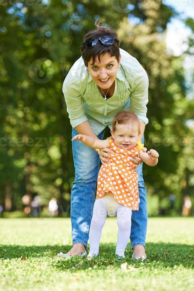 mother and baby in park photo