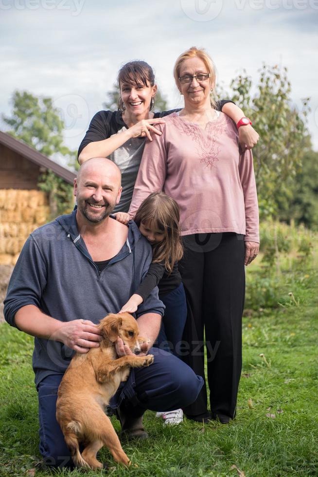 portrait of happy family at farm photo