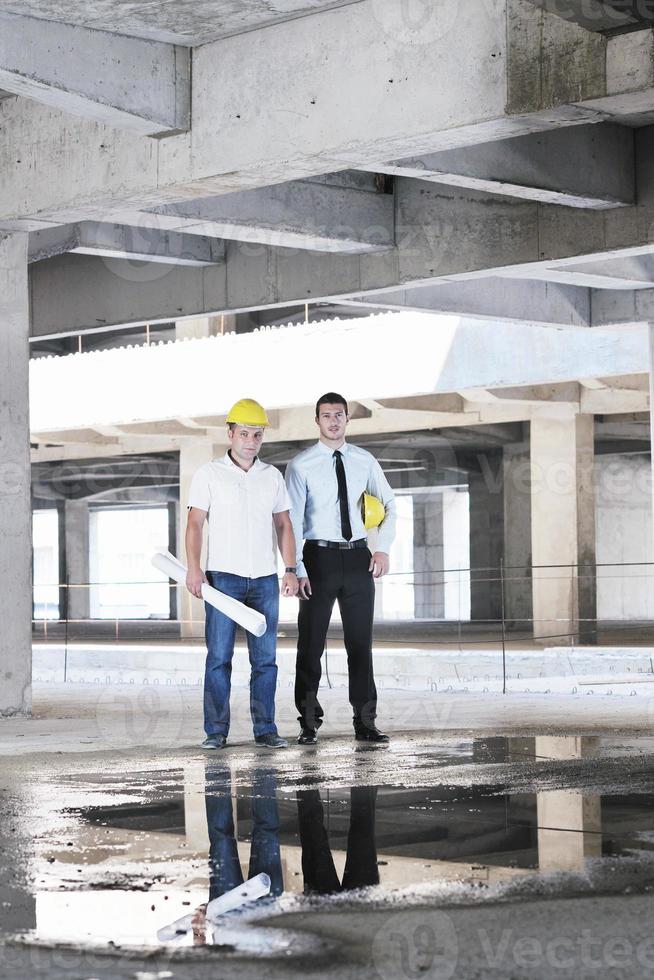 Team of architects on construciton site photo
