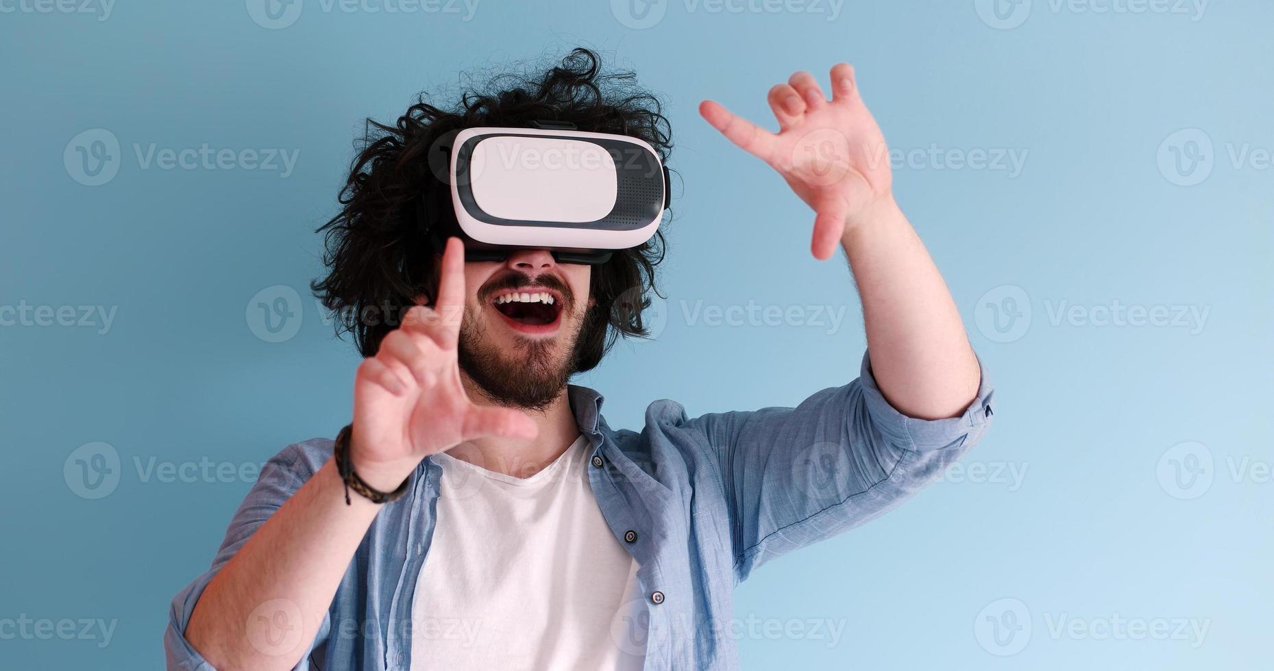 man using VR headset glasses of virtual reality photo
