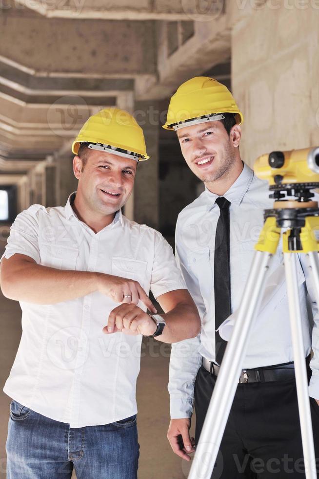 Team of architects on construciton site photo
