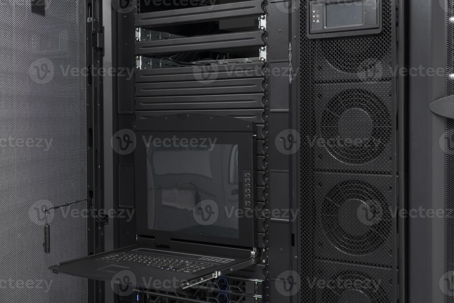Data Center With Multiple Rows of Fully Operational Server Racks. Modern Telecommunications, Cloud Computing, Artificial Intelligence, Database, Supercomputer Technology Concept. photo