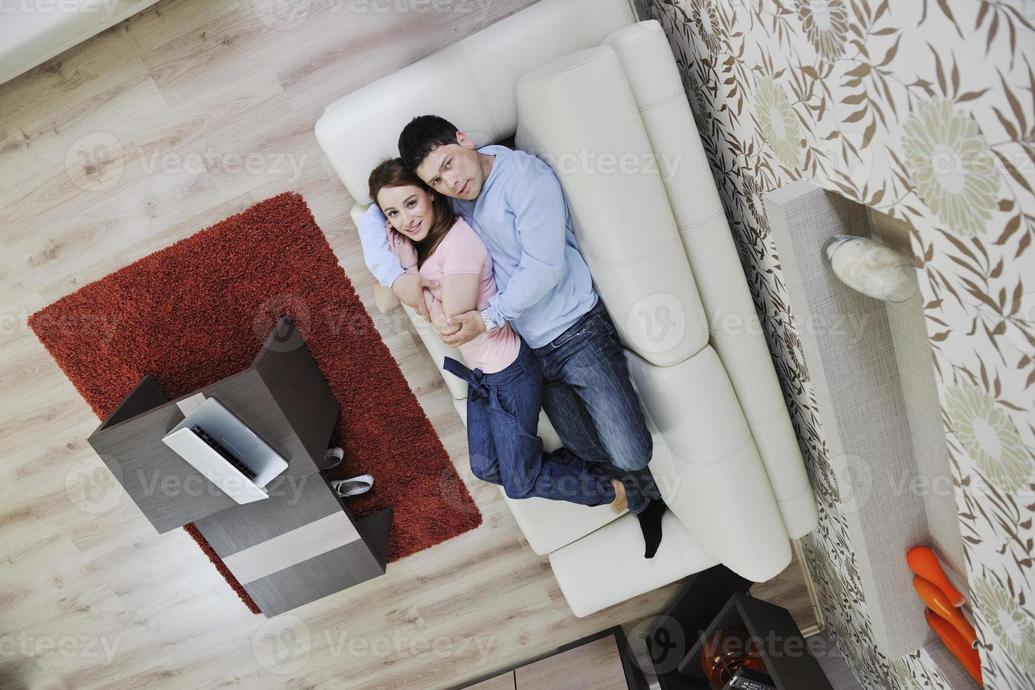 couple relax at home on sofacouple relaxing at home photo