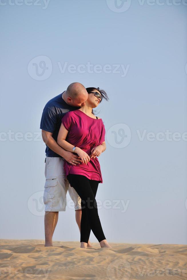 couple enjoying the sunset photo