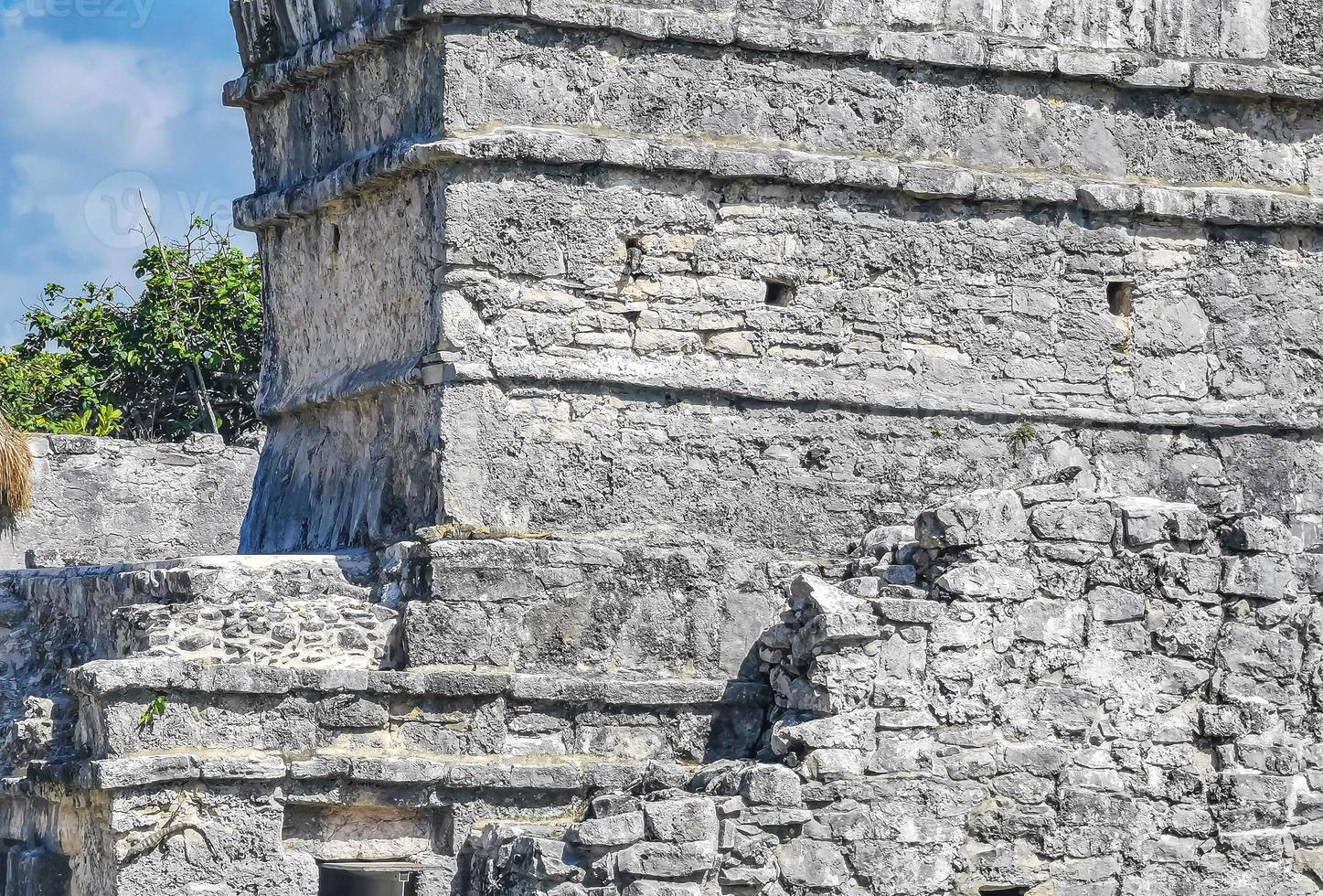 Ancient Tulum ruins Mayan site temple pyramids artifacts seascape Mexico. photo