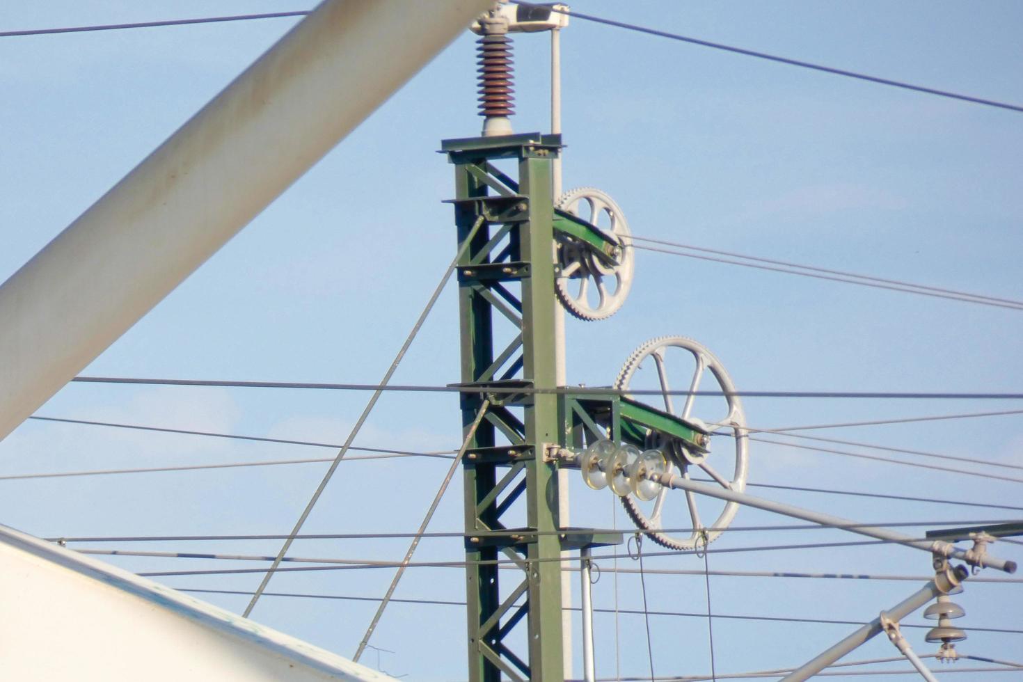 metal towers for transporting electricity from one point to another photo