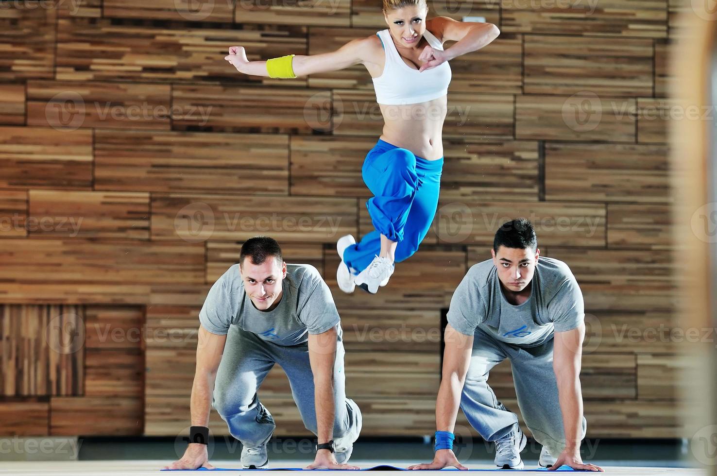 young adults group in fitness club photo