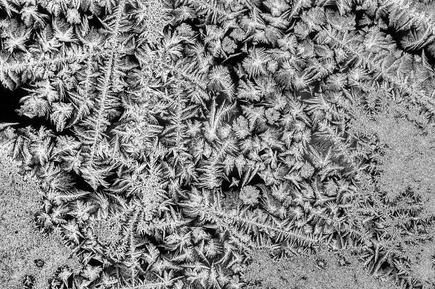 Frost on glass window photo