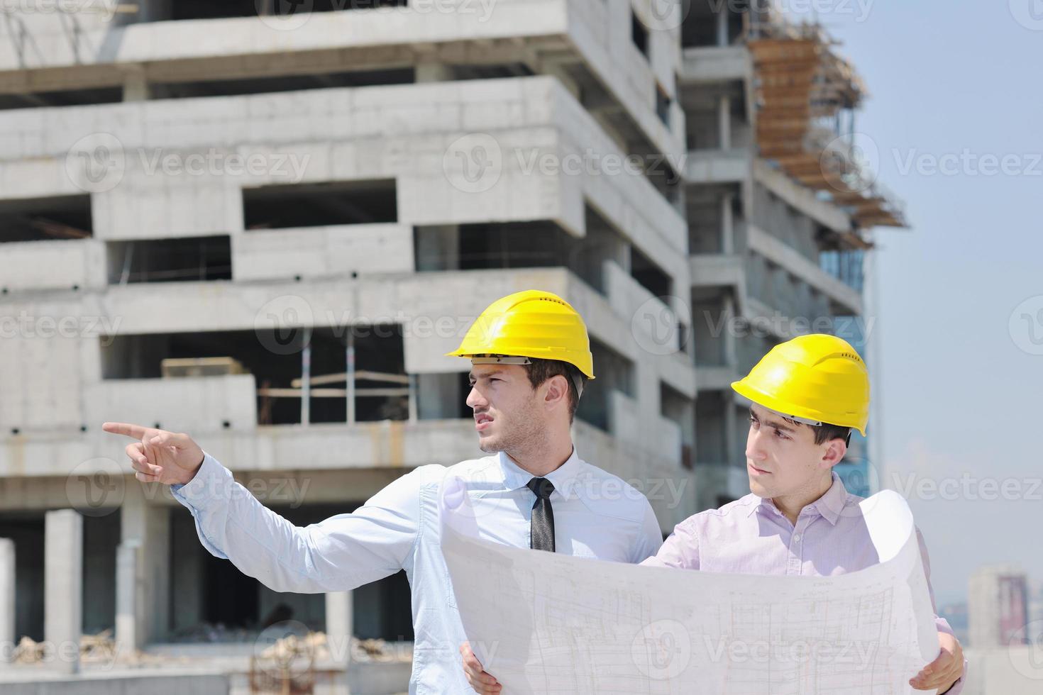 Team of architects on construciton site photo