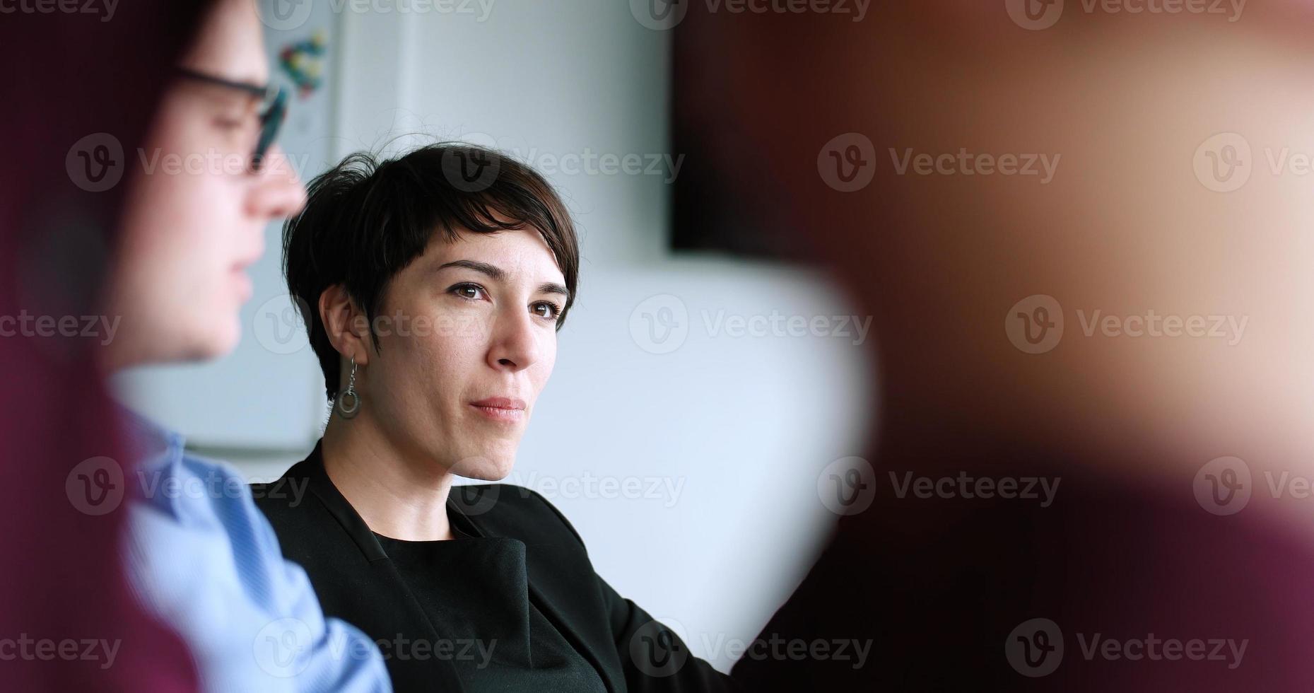 Business Team At A Meeting at modern office building photo