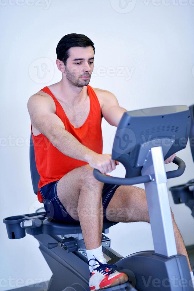 man running on the treadmill photo