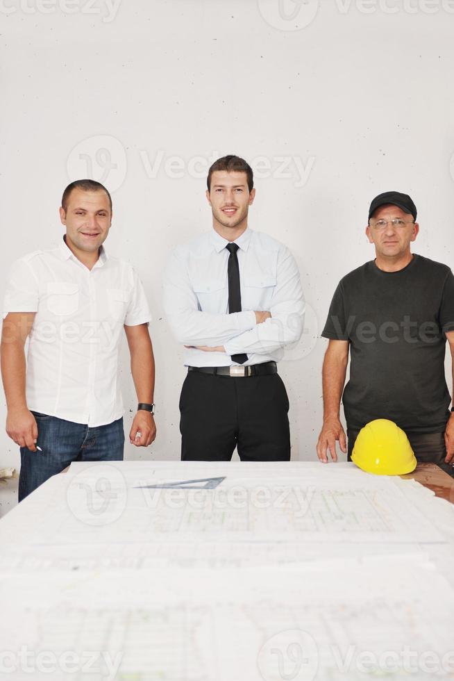 Team of architects on construciton site photo