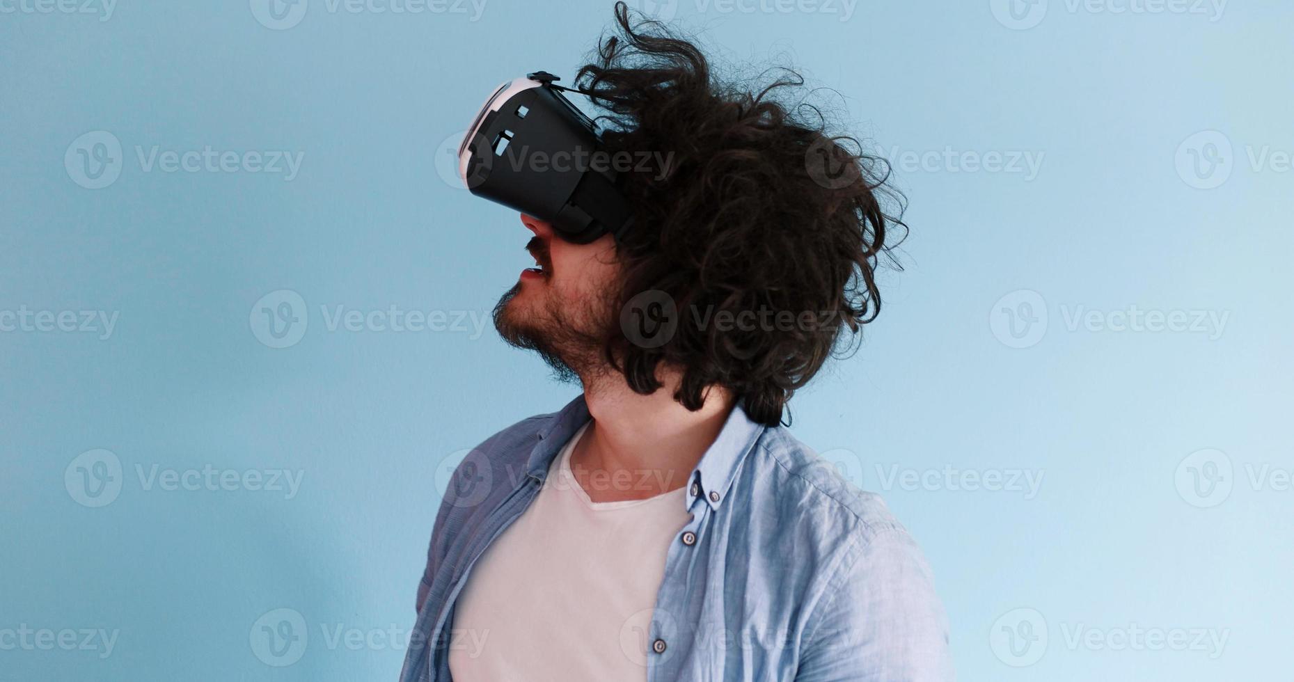 man using VR headset glasses of virtual reality photo