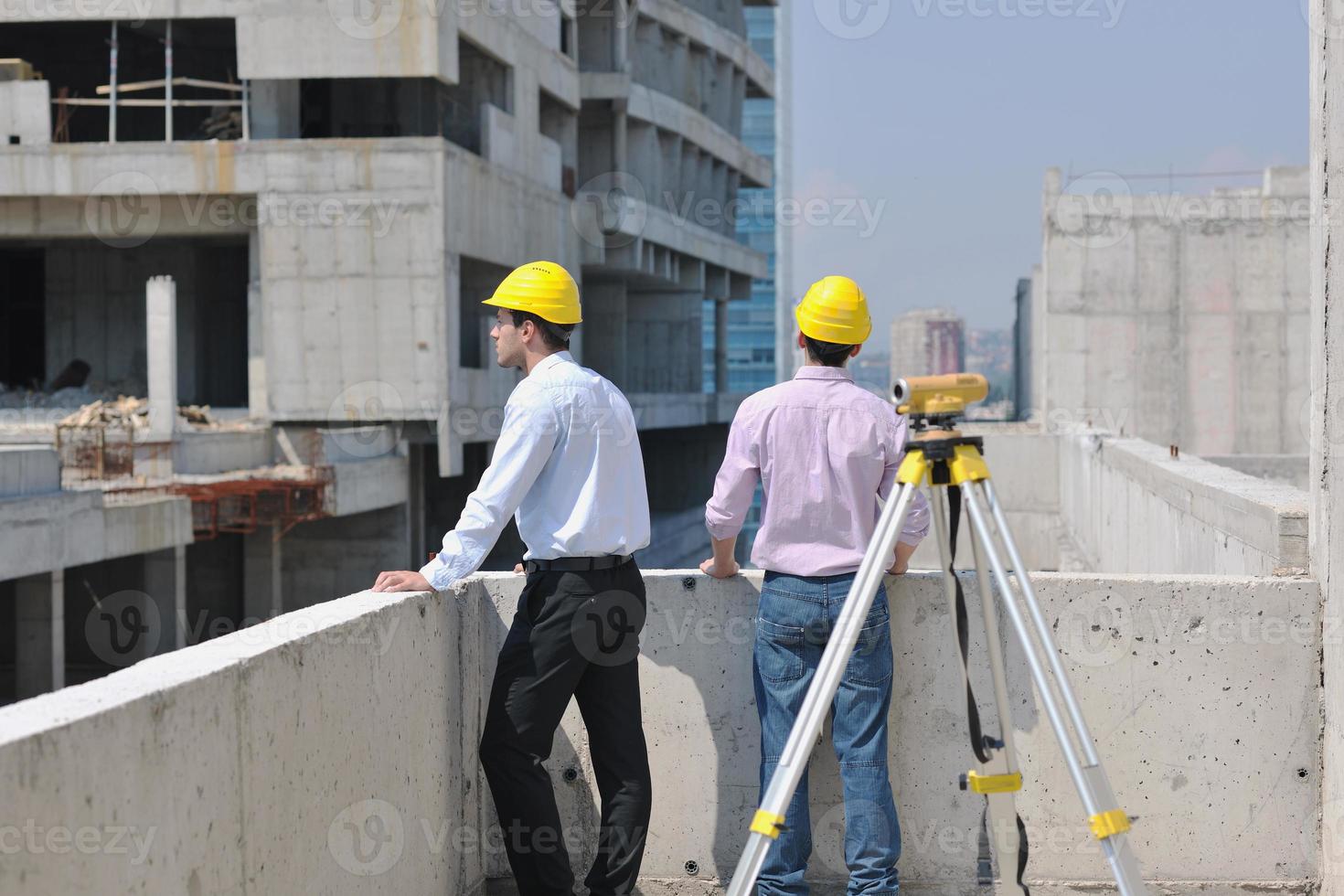 Team of architects on construciton site photo