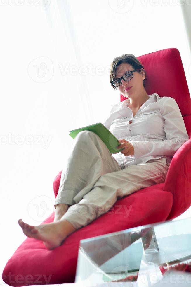woman using tablet pc at home photo