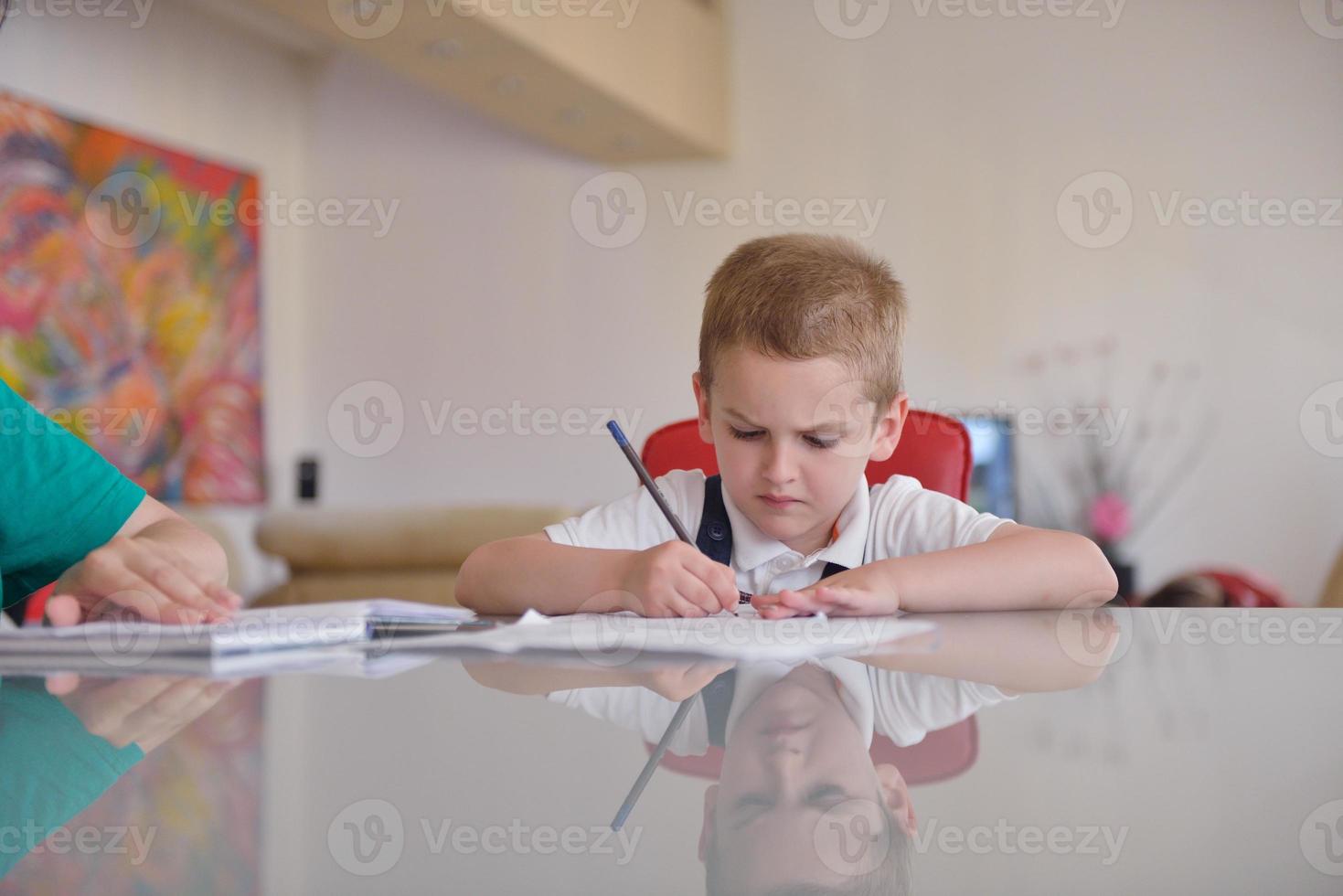 Boy doing homework photo