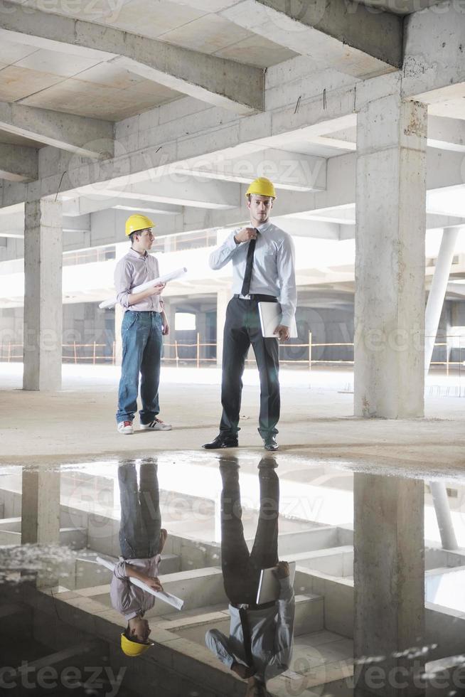 Team of architects on construciton site photo